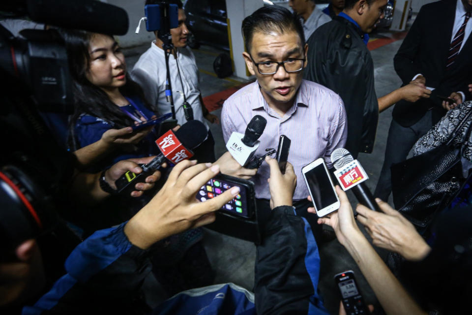 Asian Comic Cultural Museum Curator Hew Kuan Yau speaks to the media after giving his statement at the Bukit Aman headquarters October 23, 2019. — Picture by Hari Anggara