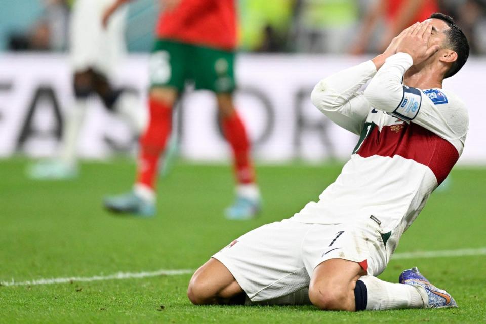 Portugal’s forward #07 Cristiano Ronaldo reacts during the Qatar 2022 World Cup quarter-final (AFP via Getty Images)