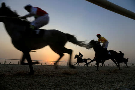 Kurdish ride horses during a march supporting the upcoming referendum in Erbil, Iraq. REUTERS/Alaa Al-Marjani