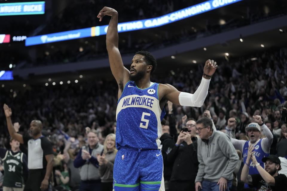 Milwaukee Bucks' Malik Beasley reacts after making a 3-pointer during the second half of an NBA basketball game Atlanta Hawks on Saturday, Dec. 2, 2023, in Milwaukee. The Bucks won 132-121. (AP Photo/Morry Gash)