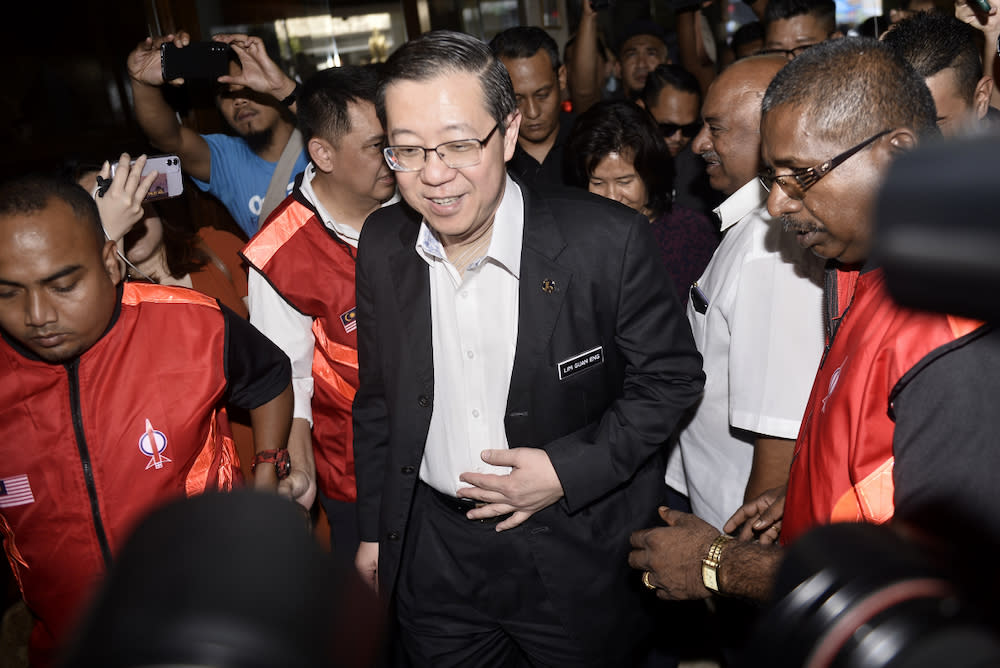 Minister of Finance, Lim Guan Eng arrives for the DAP meeting at the DAP headquarters, February 24, 2020. — Picture by Miera Zulyana