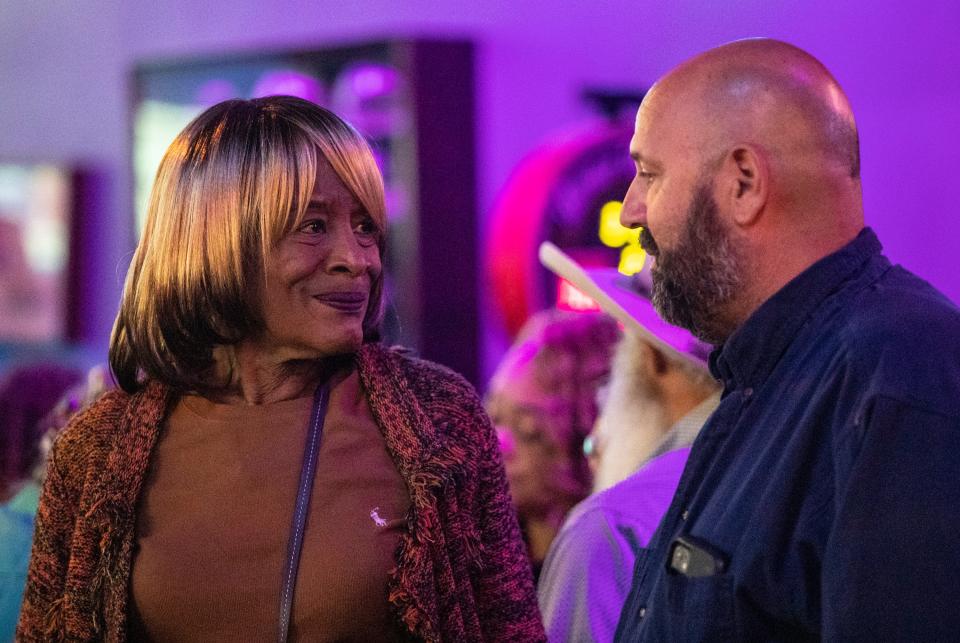 Councilmember Jan Pye talks with Desert Water Agency Division 1 candidate Stephen Bronack during an election night watch party at Playoffs sports bar on Tuesday.