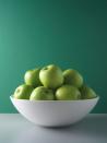 <p>And set out a giant fruit bowl instead — you’ll be more likely to reach for an apple or a banana. There really is something to the old adage “Out of sight, out of mind,” according to <strong>Dawn Jackson Blatner, R.D.N.</strong>, author of <em><a href="https://www.amazon.com/Superfood-Swap-Without-C-R-P/dp/0544535553?tag=syn-yahoo-20&ascsubtag=%5Bartid%7C10055.g.25643343%5Bsrc%7Cyahoo-us" rel="nofollow noopener" target="_blank" data-ylk="slk:The Superfood Swap;elm:context_link;itc:0;sec:content-canvas" class="link ">The Superfood Swap</a></em>. In your pantry, move <a href="https://www.goodhousekeeping.com/food-recipes/healthy/g607/quinoa-recipes/" rel="nofollow noopener" target="_blank" data-ylk="slk:healthy staples like quinoa;elm:context_link;itc:0;sec:content-canvas" class="link ">healthy staples like quinoa</a>, nuts, and canned beans to the front of shelves at eye level and put less healthy snacks and sweets on a high shelf.</p>