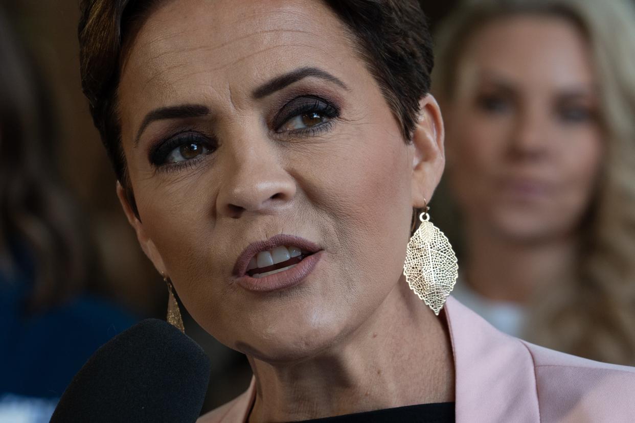 U.S. Senate candidate Kari Lake answers questions during a press conference on Feb. 7, 2024, at her headquarters in Phoenix.