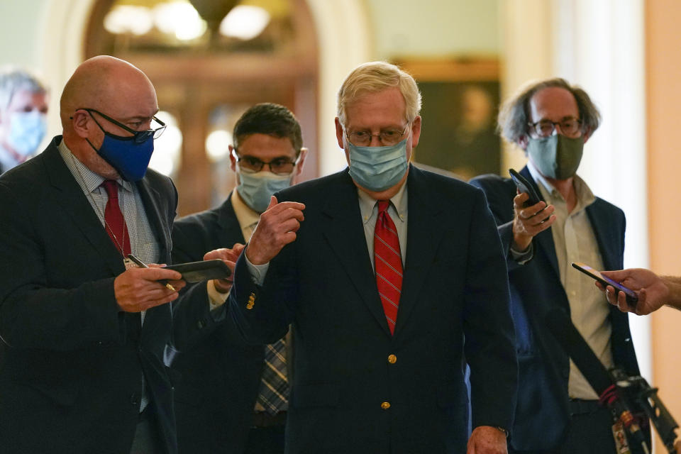 Senate Majority Leader Mitch McConnell of Ky., talks with reporters after he spoke on the Senate floor Monday, Nov. 9, 2020, at the Capitol in Washington. (AP Photo/Susan Walsh)