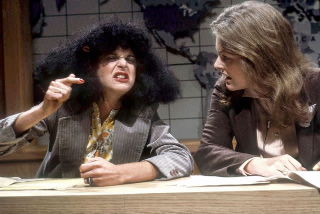 Everett Collection Gilda Radner as Roseanne Roseannadanna with Jane Curtin on 'Weekend Update'