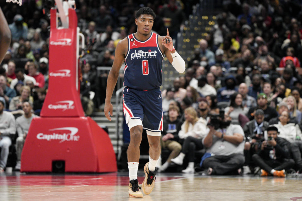 Washington Wizards forward Rui Hachimura (8) reacts after scoring against the Orlando Magic during the first half of an NBA basketball game, Saturday, Jan. 21, 2023, in Washington. (AP Photo/Jess Rapfogel)