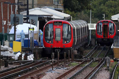 Forensic investigators search on the platform at Parsons Green tube station in London, Britain, September 15, 2017. REUTERS/Hannah McKay