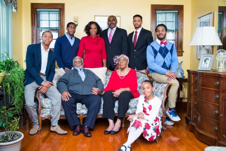 U.S. Delegate Stacey Plaskett and with her parents, husband and children. (Photo: Courtesy of Stacey Plaskett)