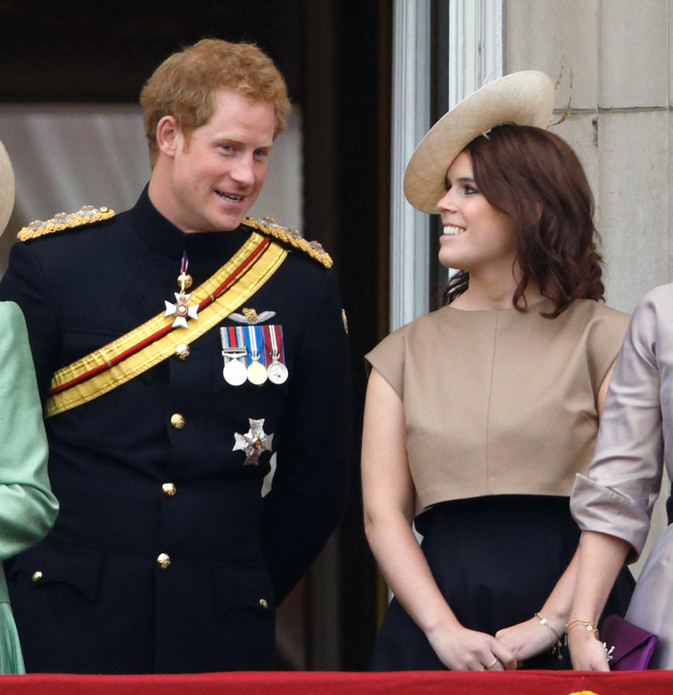 LONDON, UNITED KINGDOM - JUNE 13: (EMBARGOED FOR PUBLICATION IN UK NEWSPAPERS UNTIL 48 HOURS AFTER CREATE DATE AND TIME) Prince Harry and Princess Eugenie stand on the balcony of Buckingham Palace during Trooping the Colour on June 13, 2015 in London, England. The ceremony is Queen Elizabeth II's annual birthday parade and dates back to the time of Charles II in the 17th Century, when the Colours of a regiment were used as a rallying point in battle. (Photo by Max Mumby/Indigo/Getty Images)