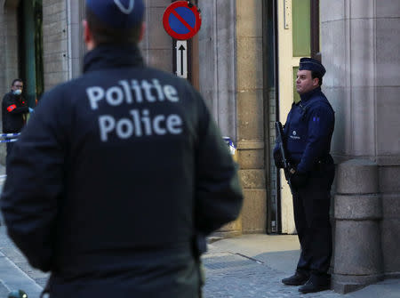 Police keep watch outside the police headquarters after a knife attack on a police officer, according to local media reports, in Brussels, Belgium November 20, 2018. REUTERS/Yves Herman