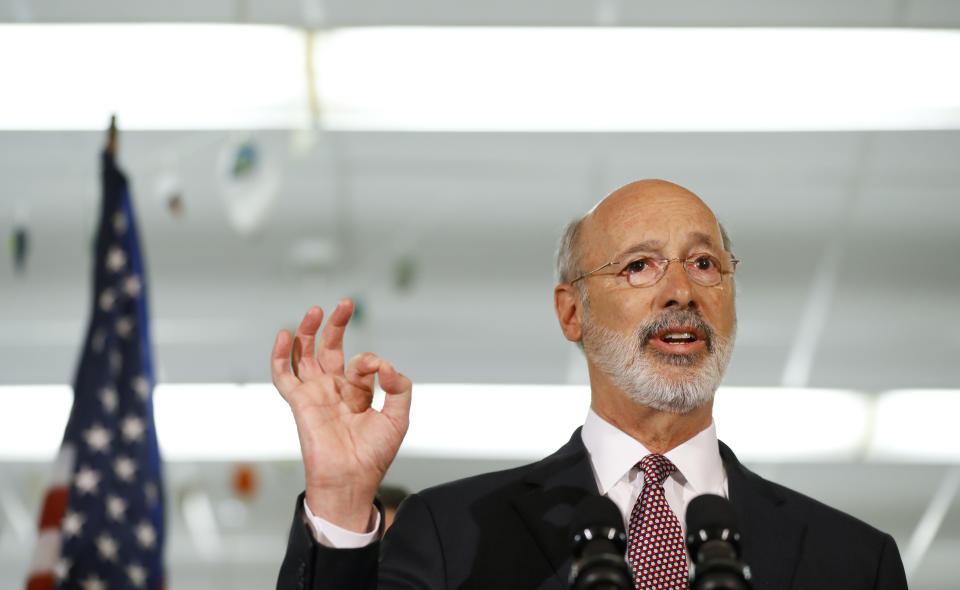 FILE - In this March 21, 2019 file photo, Pennsylvania Gov. Tom Wolf speaks during a news conference at the John H. Taggart School library, in Philadelphia. Wolf has signed numerous executive orders while Democrats’ agenda is stalled in the GOP-controlled Legislature, including calling for new gun violence prevention programs. (AP Photo/Matt Slocum, File)