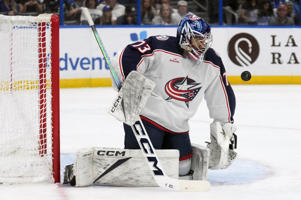 Columbus Blue Jackets goaltender Jet Greaves (73) makes a save on a shot by the Tampa Bay Lightning during the second period of an NHL hockey game Tuesday, April 9, 2024, in Tampa, Fla. (AP Photo/Chris O'Meara)