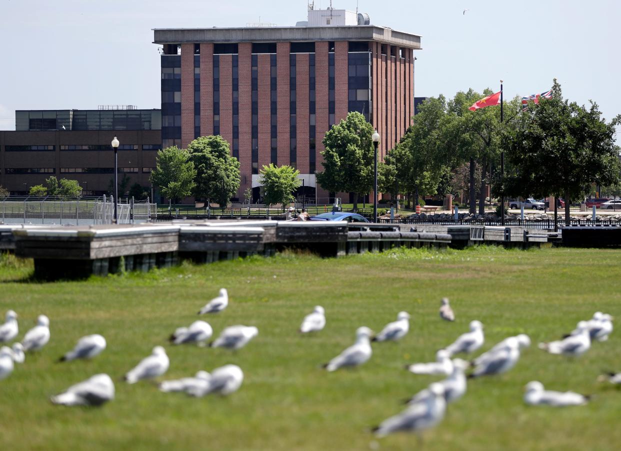 The Wisconsin Public Service office, located on North Adams Street, is pictured from across the Fox River at Leicht Park on July 17, 2020, in Green Bay, Wis.