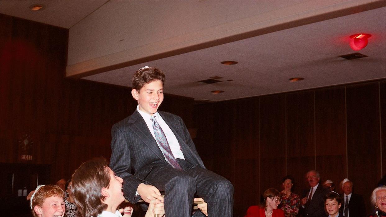 boy with his friends at bar mitzvah party