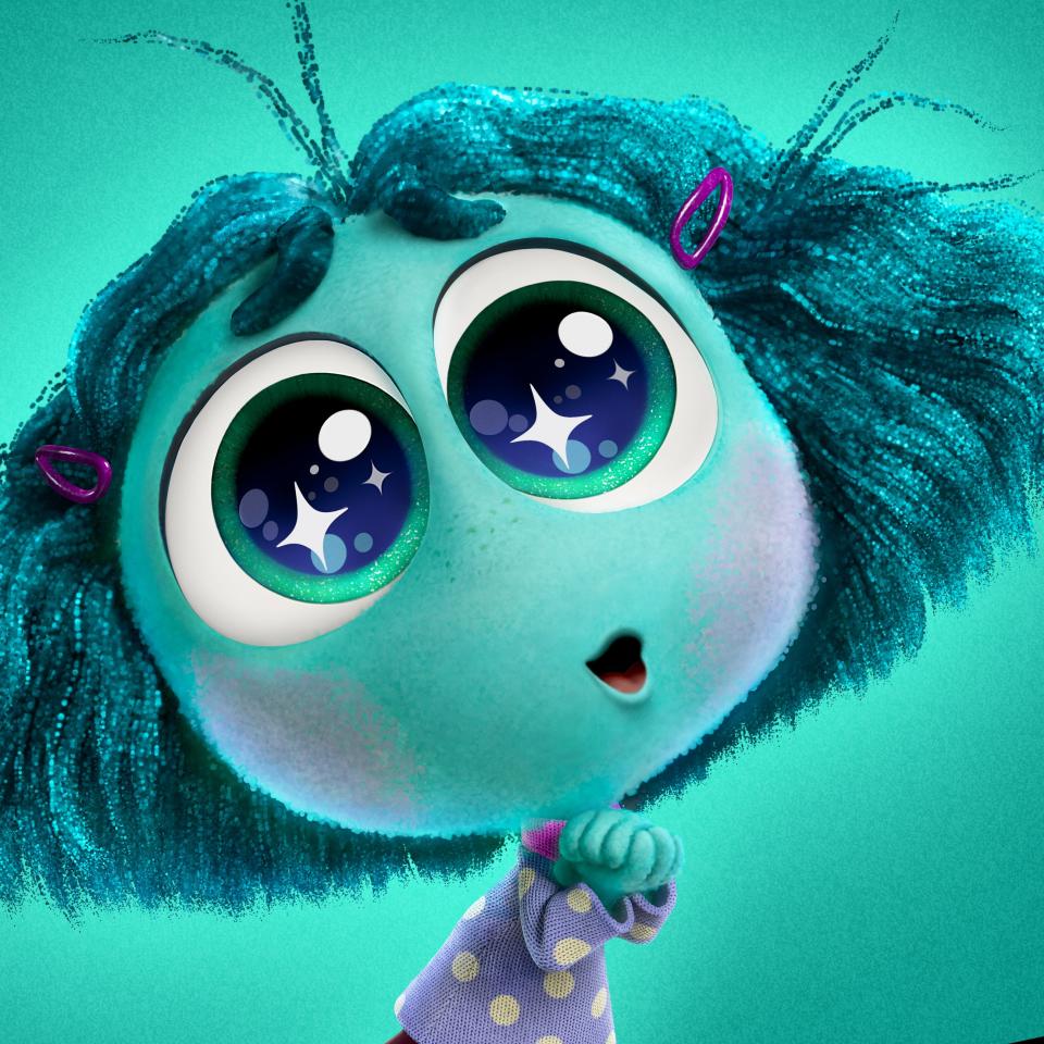 Animated character Envywith blue skin and hair, large sparkling eyes, and wearing a polka-dotted shirt