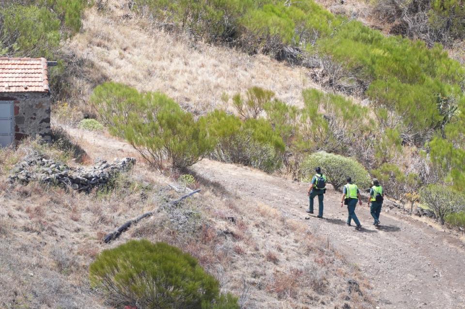 Members of a search and rescue team near the last known location of Jay Slater (James Manning/PA) (PA Wire)