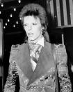 <p>David Bowie worked numerous hairstyles throughout his life, but his Ziggy Stardust vibe will never be forgotten. [Photo: PA] </p>