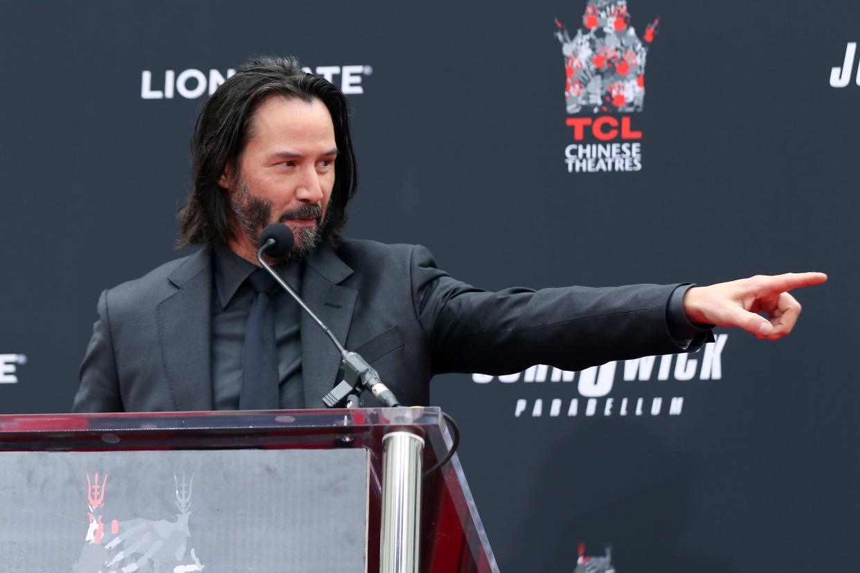 Keanu Reeves speaks during a hand and footprint ceremony honoring him at the TCL Chinese Theatre on Tuesday, May 14, 2019 at in Los Angeles. (Photo by Willy Sanjuan/Invision/AP)