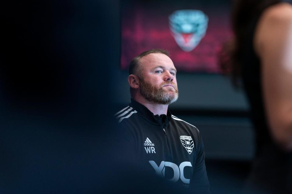 Wayne Rooney waits to speak during a news conference to announce him as the new head coach of MLS soccer club D.C. United, Tuesday, July 12, 2022, in Washington. (AP Photo/Alex Brandon)