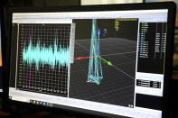 A computer graphic shows stability tests on a 13-foot-tall wind turbine in a wave pool, Wednesday, March 27, 2024, at the University of Maine, in Orono, Maine. (AP Photo/Robert F. Bukaty)