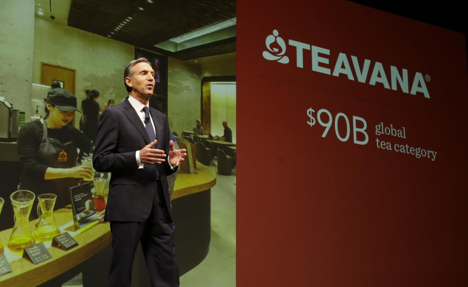 Howard Schultz, chairman and CEO of Starbucks Coffee Company, talks about Starbucks' Teavana tea products, Wednesday, March 19, 2014, at the company's annual shareholders meeting in Seattle. Schultz says growth in the tea market is a key part of Starbucks' strategy for the years ahead. (AP Photo/Ted S. Warren)