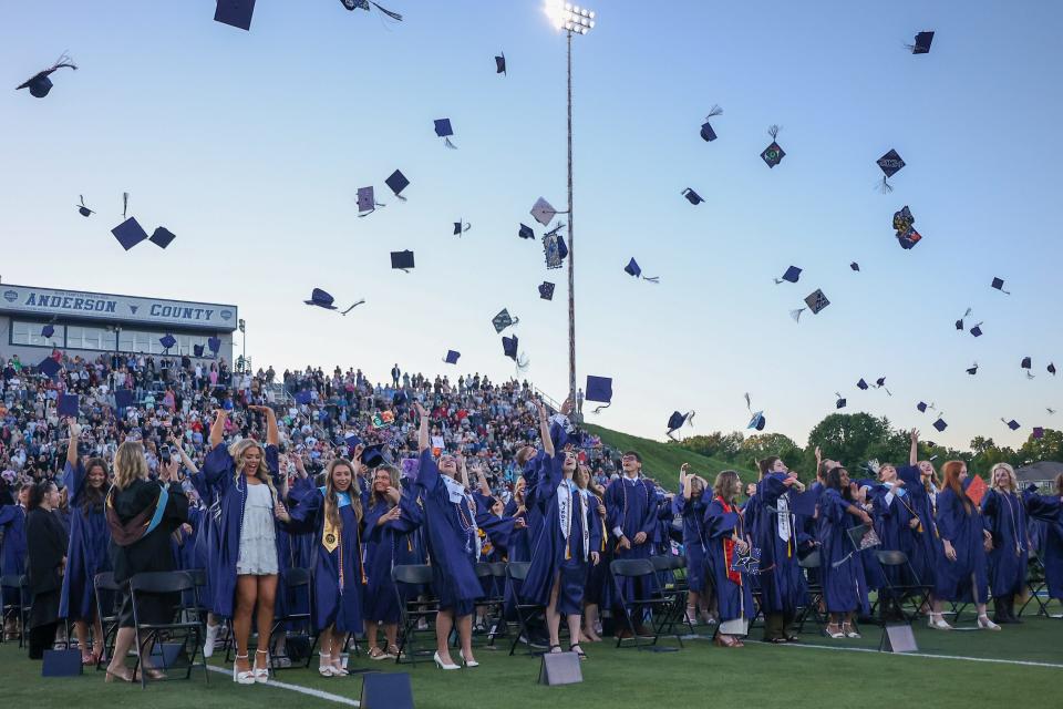 Anderson County High School students graduate in Clinton, Tennessee, on May 10. High school students seeking guaranteed admission to a University of Tennessee school will now need to perform well on standardized tests to be approved.