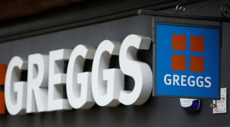 FILE PHOTO: File photo of a sign outside a Greggs bakery in Bradford