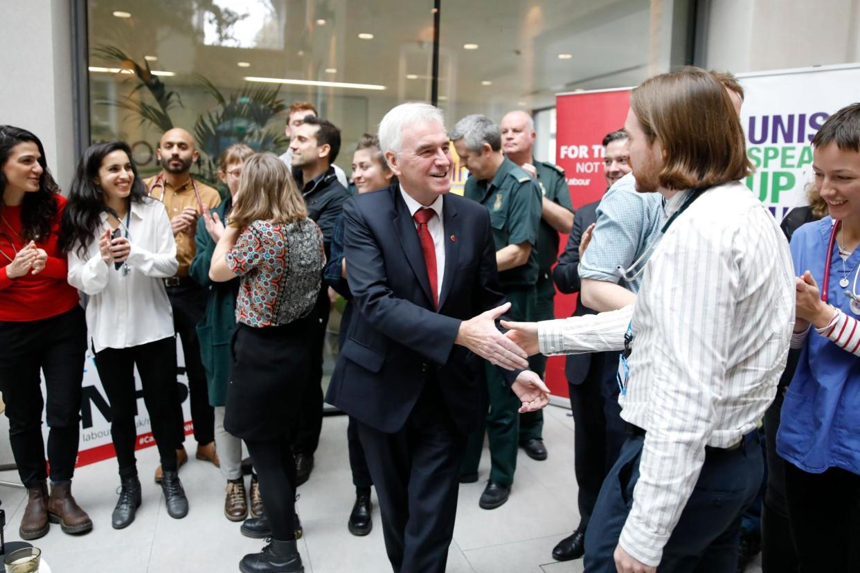 Shadow Chancellor John McDonnell meets NHS staff in central London: AFP via Getty Images