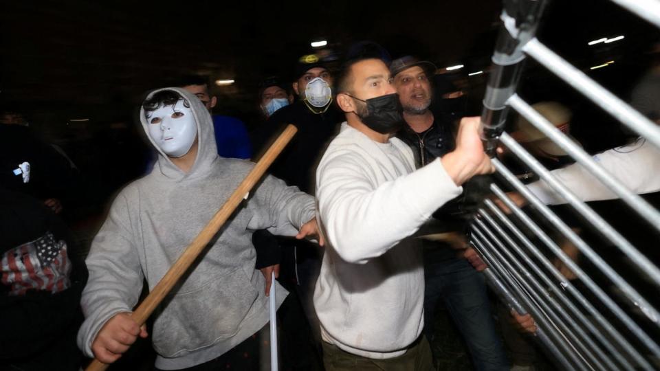 PHOTO: Counter-protesters try to remove barricades at a pro-Palestinian encampment on the University of California, Los Angeles (UCLA) campus, May 1, 2024, in Los Angeles.  (David Swanson/Reuters)