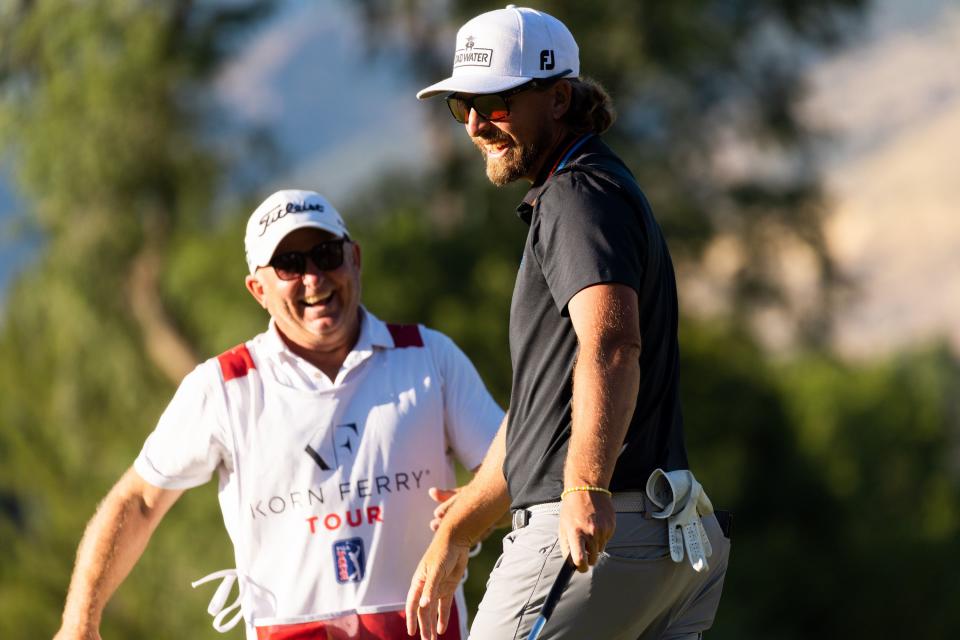 Roger Sloan and his caddie celebrate after Sloan’s win at the Utah Championship, part of the PGA Korn Ferry Tour, at Oakridge Country Club in Farmington on Sunday, Aug. 6, 2023. Sloan won with a final score of -24. | MEGAN NIELSEN, Megan Nielsen, Deseret News