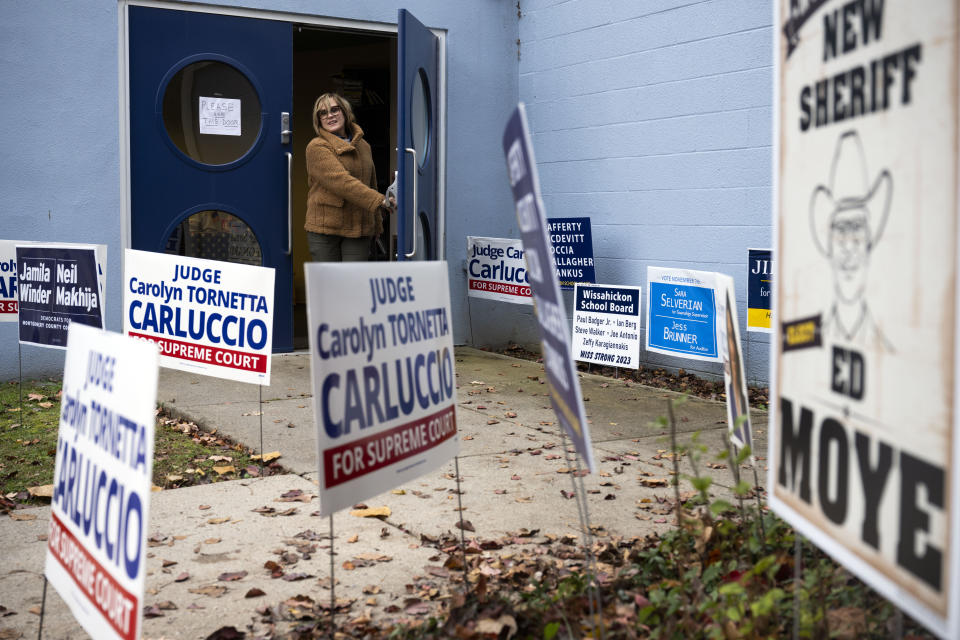 Maurine Bogut exits the Wissahickon Valley Public Library after voting on Election Day in Blue Bell, Pa. on Tuesday, Nov. 7, 2023. (AP Photo/Joe Lamberti)