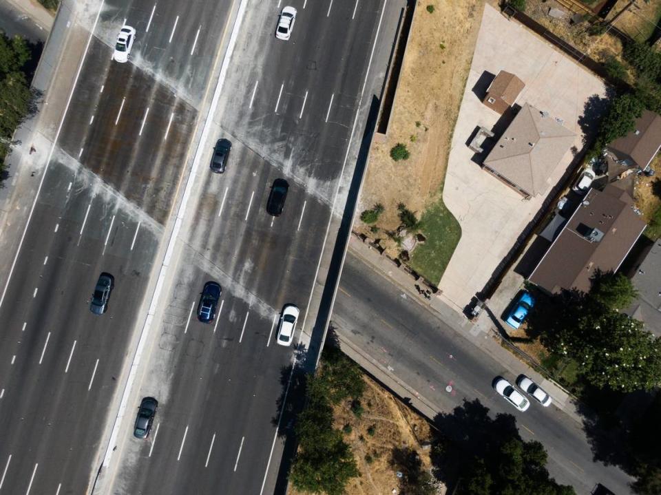 Cars drive over the Highway 99 bridge at 21st Avenue in south Sacramento on Sunday, June 6, 2021. The freeway will be closed for approximately four miles, in both directions, from the morning of June 11 to the morning of June 16 to work on the bridge.