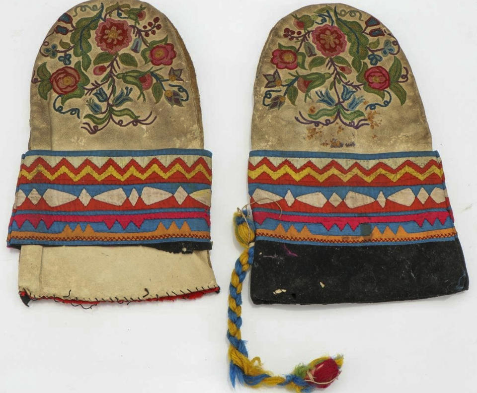 This undated photo provided on Wednesday, July 20, 2022, by Gregory Scofield, shows two mittens he made in the late 19th-century Cree-Metif native Canadian traditional style. The Vatican's Anima Mundi Ethnological Museum houses tens of thousands of artifacts and art made by Indigenous peoples from around the world. The restitution of Indigenous and colonial-era artifacts, a pressing debate for museums and national collections across Europe, is one of the many agenda items awaiting Francis on his trip to Canada, which begins Sunday. (Gregory Scofield via AP)