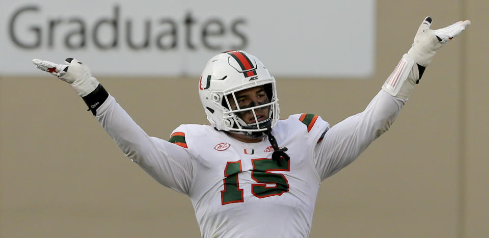 Jaelan Phillips of Miami celebrates a defensive stop against Virginia Tech. (Matt Gentry/The Roanoke Times via AP, Pool)