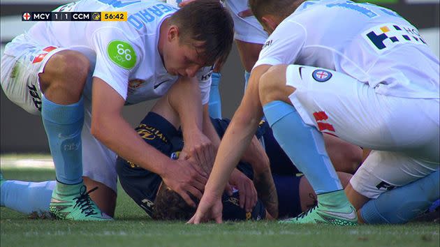 City players comfort Roux. Image: FoxSports