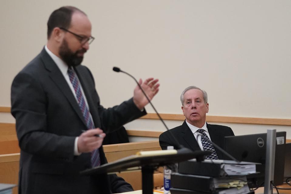 Wayne Ballard appears in Rockland County Court in New City on Tuesday, January 31, 2023 as opening statements are read by his attorney Noam Greenspan.  Ballard, the former chief of the Spring Valley building and public works departments, is charged with filing a false 2020 report with New York state that claimed the Evergreen Court facility had been inspected. In March 2021, a Spring Valley firefighter and an adult home resident died in a fire at the Lafayette Street adult home