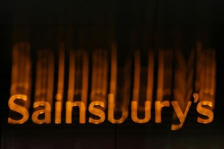 A Sainsbury's supermarket sign is seen in London January 6, 2015. REUTERS/Stefan Wermuth