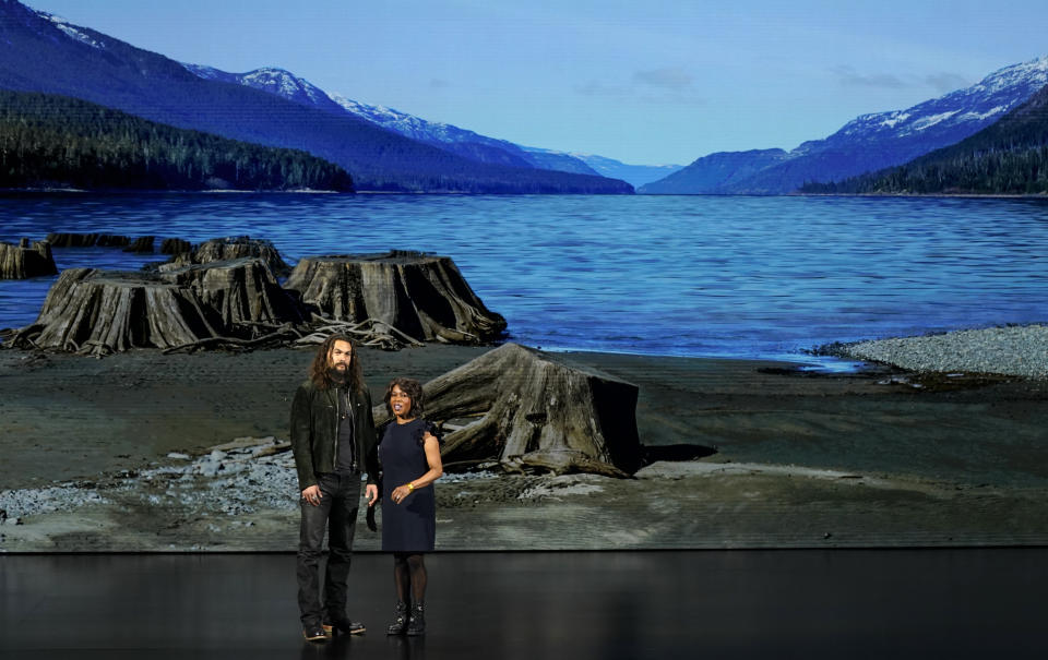 Jason Momoa, left, and Alfre Woodard speak at the Steve Jobs Theater during an event to announce Apple new products Monday, March 25, 2019, in Cupertino, Calif. (AP Photo/Tony Avelar)