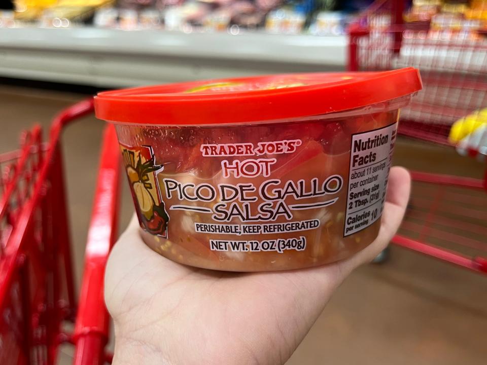 The writer holds Trader Joe's hot pico de gallo