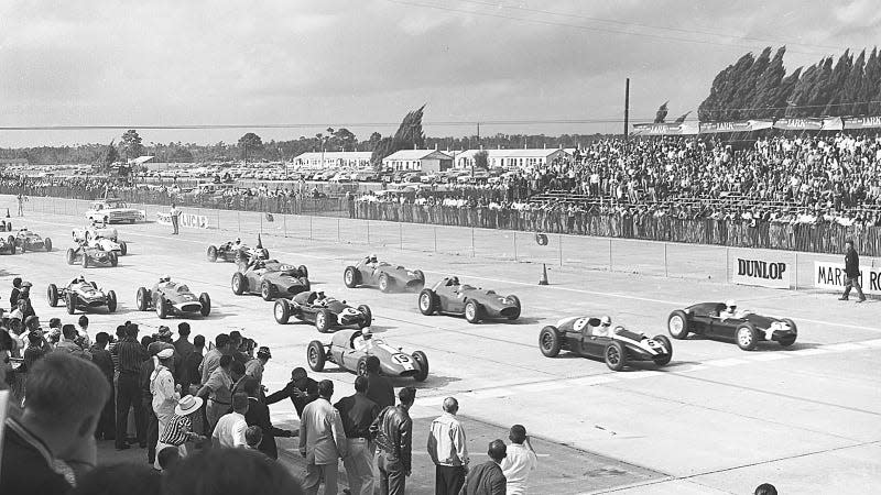 A black and white photo of F1 cars at Sebring International Raceway. 