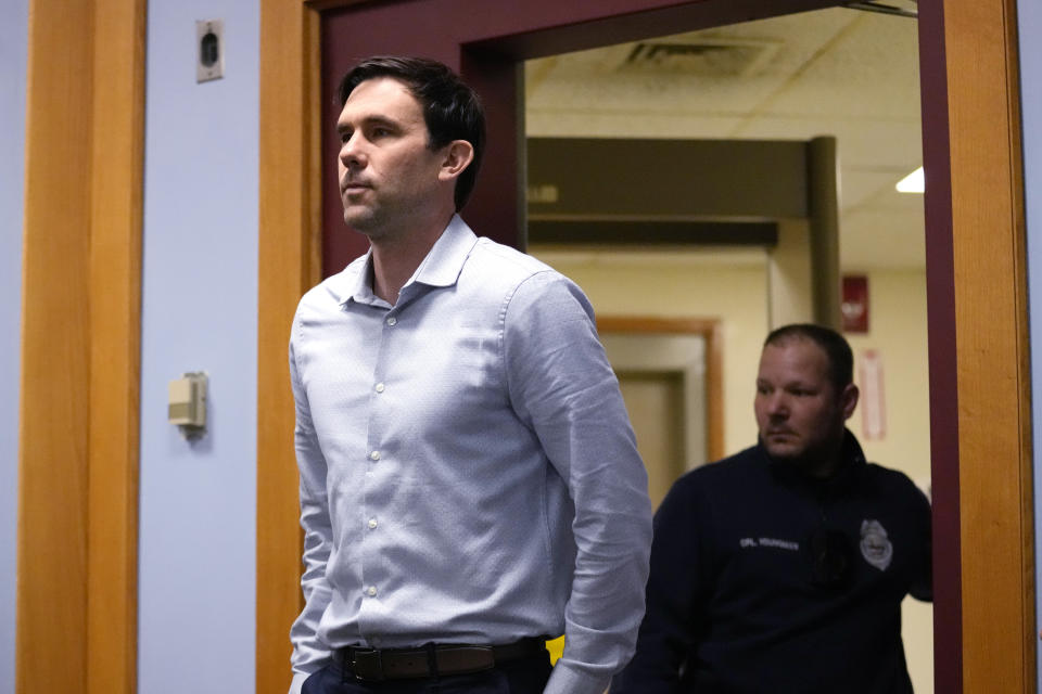 James Parker arrives for his parole hearing, Thursday, April 18, 2024, in Concord, N.H. Parker, who served more than half of his life in prison for his role in the 2001 stabbing deaths of two married Dartmouth College professors as part of a plan to rob and kill people before fleeing overseas has been granted parole. (AP Photo/Charles Krupa)