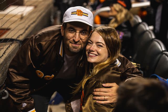 <p>Matt Thomas/San Diego Padres/Getty</p> Emma Stone and her husband Dave McCary in 2022.