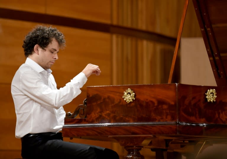 Competitor French pianist Benjamin d'Anfray says playing the antique pianos, with their technical differences to modern ones, is like being "sucked into another world"