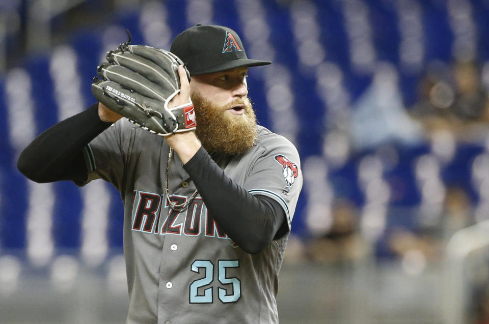 Arizona Diamondbacks' Archie Bradley delivers a pitch during the seventh inning of a baseball game against the Miami Marlins, Tuesday, June 26, 2018, in Miami. The Diamondbacks defeated the Marlins 5-3. (AP Photo/Wilfredo Lee)