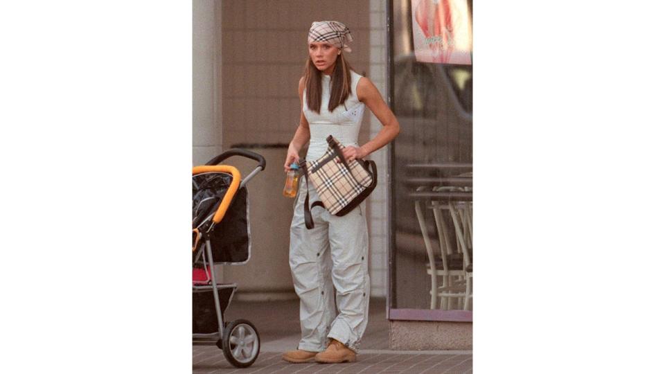 Pop Singer Victoria Adams "Posh Spice" along with her mother Jackie Adams get help loading the limo with their packages October 12, 2000 in Los Angeles, CA