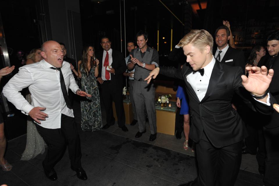 IMAGE DISTRIBUTED FOR AMC - Dean Norris, left, and Derek Hough attend the AMC, IFC, Sundance Channel Emmy After Party, on Sunday, September 22, 2013 in West Hollywood, Calif. (Photo by John Shearer/Invision for AMC/AP Images)