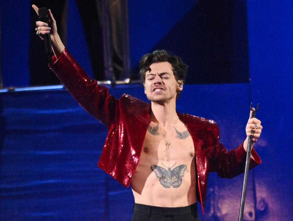 Harry Styles performs live on stage during The BRIT Awards 2023 at The O2 Arena