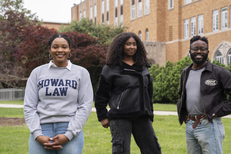 Alyssa Whitaker, 25, left, Kenadi Mitchell, 24, and Awa Nyambi, 25, law students at Howard University School of Law, pose for a portrait, Friday, April 19, 2024, in Washington. The students are part of a group of young Black lawyers working to protect voting rights during the 2024 election. (AP Photo/Jacquelyn Martin)