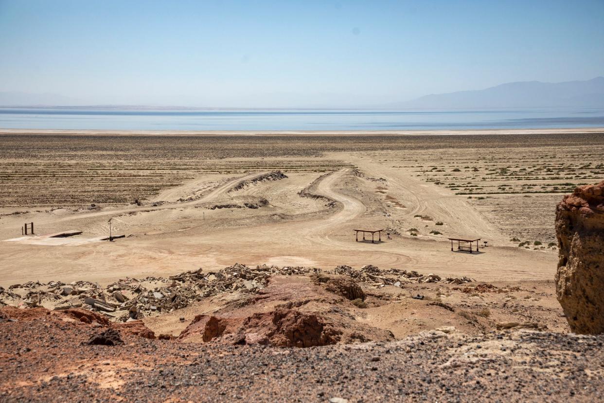 An old boat ramp at Red Hill Marina County Park is seen now separated from the Salton Sea in Calipatria, Calif., Wednesday, May 18, 2022. The ramp hasn’t been functional in about 12 years as the sea’s shoreline has receded. 